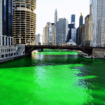 green river in between office and building towers